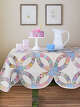 This 1940s double wedding ring quilt, sourced by Weston Table, makes a cozy tablecloth.