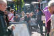 Tourists wait for a table at a restaurant in Carmel. Locals complain of excessive crowds, but many acknowledge that the town relies on tourist spending to fund city services.
