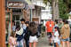 People wait for a seat at Little Swiss Cafe in Carmel. The town has experienced a rise in tourism, partly related to the full reopening of Highway 1 between Los Angeles and San Francisco.