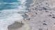 Beachgoers in Carmel-by-the-Sea on Thursday, July 23, 2026. In response to hundreds of complaints from locals over too much tourism, the city council slashed almost $300,000 in annual marketing funds to the regional tourism bureau last month.