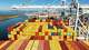 FILE - Cargo containers line a ship at the Port of Oakland on Wednesday, Aug. 6, 2025, in Oakland, Calif.