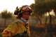 Firefighters battle a wildfire in San Martin de Valdeiglesias, west of Madrid, Spain, Sunday, July 26, 2026.