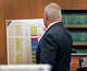 Defense attorney Kevin Reddington shows a list of medication prescribed to Lindsay Clancy to the jury on the opening day of her murder trial at Plymouth Superior Court July 27, 2026. Clancy is charged with killing her three children, Cora, Dawson and Callan in their Duxbury, Mass., home in 2023.