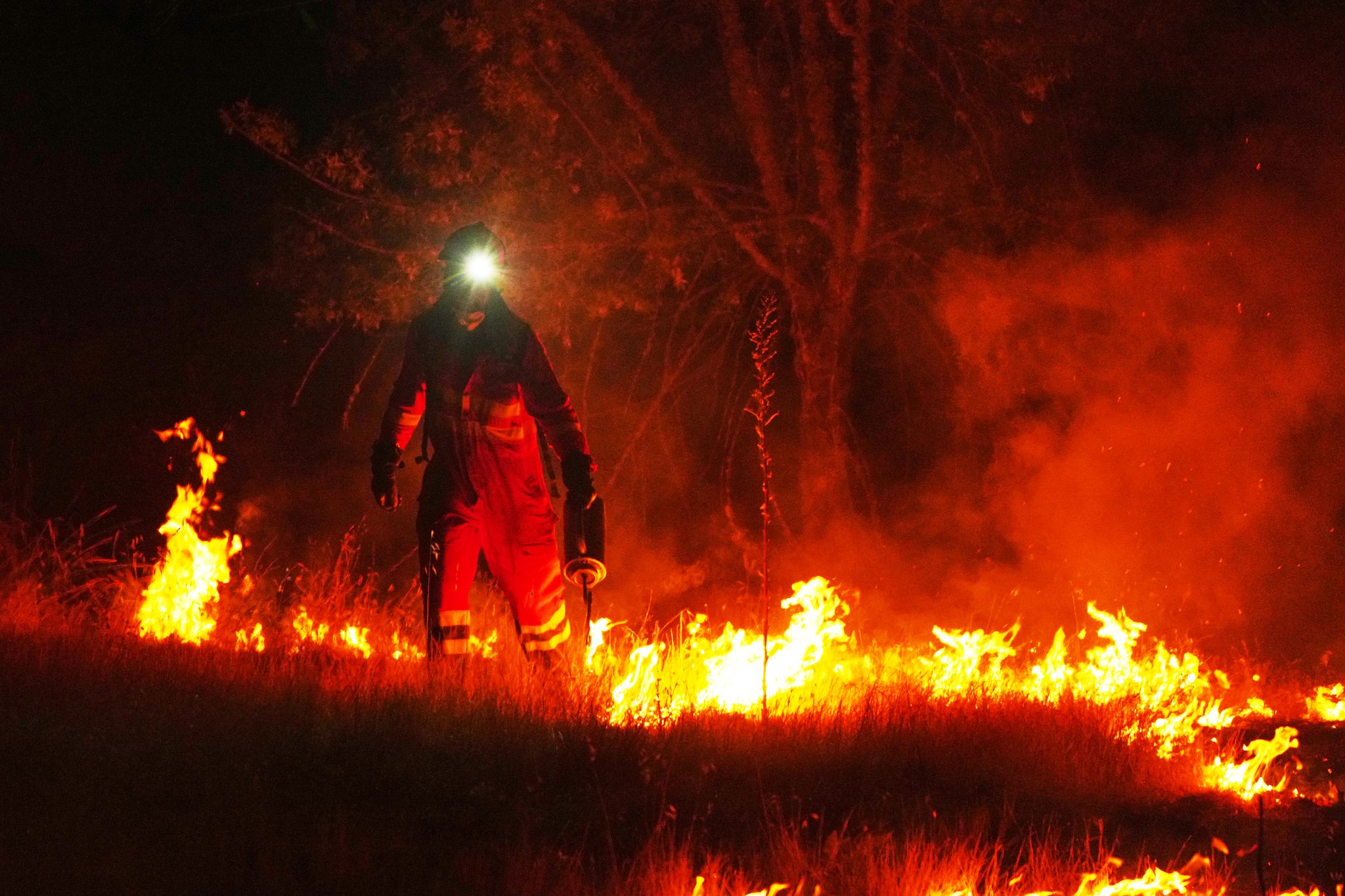 Europe battles fast-moving wildfires sweeping across Spain and France, in photos