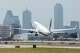 An Eastern Air Express plane carrying people in restraints takes-off at Dallas Love Field on Tuesday, July 28, 2026, in Dallas.