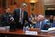 David Schertler, Dr. Anthony Fauci's defense lawyer, is escorted out, as Fauci appears before the Senate Homeland Security and Governmental Affairs Committee at the Capitol, Wednesday, July 29, 2026, in Washington.