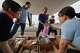 Residents receive food supply following an earthquake in Hikawa, Kumamoto Prefecture, southern Japan, Thursday, July 30, 2026.