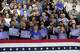 Attendees listen as President Donald Trump speaks at General Motors proving ground, Monday, July 27, 2026, in Milford, Mich.