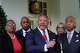FILE - Marc Morial, center, President and Chief Executive Officer of the National Urban League, talks with reporters outside the West Wing of the White House in Washington, July 8, 2021, following a meeting with President Joe Biden and leadership of top civil rights organizations.