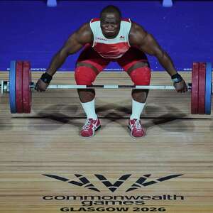 A magical silver for lifter Tchatchet, 12 years after defecting at the Commonwealth Games
