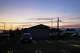 Hirokazu Sato, his wife and their three children live temporarily inside their car, center left, parked at the parking lot of the Hikawa Town Hall in Hikawa, southern Japan, Thursday, July 30, 2026, two days after an earthquake hit the area.