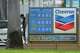 FILE - A customer pumps gas at a Chevron station Wednesday, May 27, 2026, in North Miami, Fla.