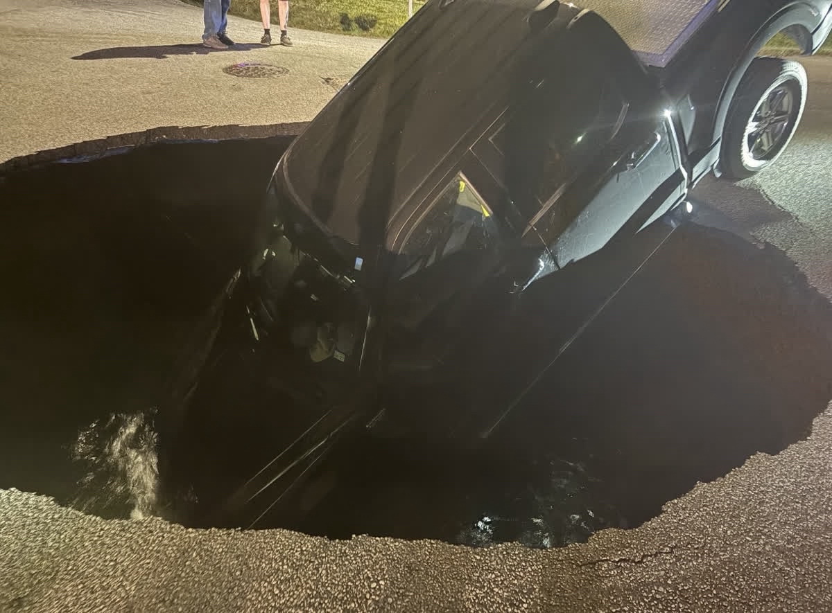 Beaumont driver safe after truck falls into sinkhole