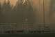 Old Trails Fire burns near Dwight Merkel Sports Complex, Saturday, Aug. 1, 2026, in Spokane, Wash.