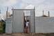 Esther Lutula, a 26 year-old woman who is four months pregnant and a mother of four, who stopped going for prenatal checkups shortly after the current Ebola outbreak, stands outside her house in Bunia, northeastern, Congo, Tuesday, June 16, 2026.