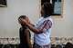 Esther Lutula, a 26 year-old woman who is four months pregnant and a mother of four, who stopped going for prenatal checkups shortly after the current Ebola outbreak, caresses her child outside her house in Bunia, northeastern, Congo, Tuesday, June 16, 2026.