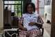 Esther Lutula, a 26 year-old woman who is four months pregnant and a mother of four, sits outside her house in Bunia, northeastern, Congo, Tuesday, June 16, 2026.