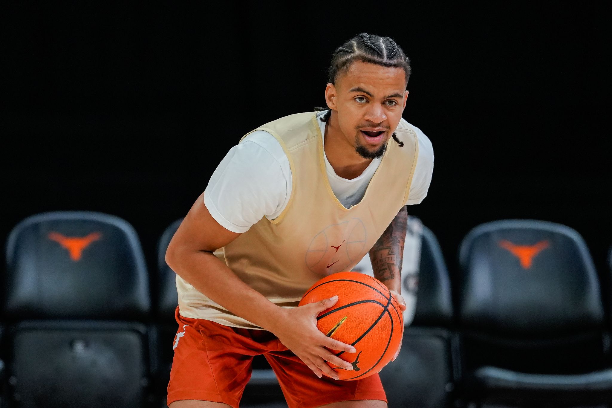 Texas guard Mikey Lewis breaks bone in foot and miss start of season