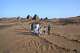 A family visits the Meroe pyramids at the Meroe archaeological site in Bejrawiya, Sudan, Friday, July 31, 2026.