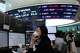 A currency trader talks on the phone at the foreign exchange dealing room of the Hana Bank headquarters in Seoul, South Korea, Monday, Aug. 10, 2026.