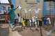 A health worker dries boots that were washed to prevent the spread of the Ebola virus at the treatment centre in Bunia General Hospital in Ituri, eastern Congo, Tuesday, Aug. 11, 2026.