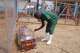 A health worker on the dignified and safe burial team, monitors a casket at the treatment centre in Bunia General Hospital in Ituri, eastern Congo, Tuesday, Aug. 11, 2026.