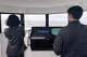 Navier CEO Sampriti Bhattacharyya, left, looks forward as an engineer guides the boat in San Francisco Bay on July 10, 2026.