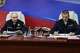 Russian President Vladimir Putin, left, and Russian Pacific Fleet Commander-in-Chief Admiral Viktor Liina attends a meeting with navy officers on board of the Varyag missile cruiser of the Pacific Fleet during a military exercise near Yuzhno-Sakhalinsk, on Sakhalin Island, Russia, Wednesday, Aug. 12, 2026. (Gavriil Grigorov, Sputnik, Kremlin Pool Photo via AP)