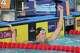 Gretchen Walsh, of the United States, celebrates after winning the women's 50-meter butterfly final at the Pan Pacific Swimming Championships in Irvine, Calif., Wednesday, Aug. 12, 2026.