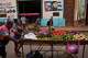 Street vendors push their cart of vegetables past a mural of Fidel Castro in Havana, Cuba, Wednesday, Aug. 12, 2026.