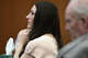 Lindsay Clancy reacts as prosecutors play a video of a family outing during her murder trial Aug. 13, 2026, in Plymouth, Mass.