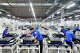 FILE: Workers produce new energy vehicle batteries on the production line of Huating New Energy Technology Co. Ltd. in Liuzhou, Guangxi, China, on Sept. 8, 2025.
