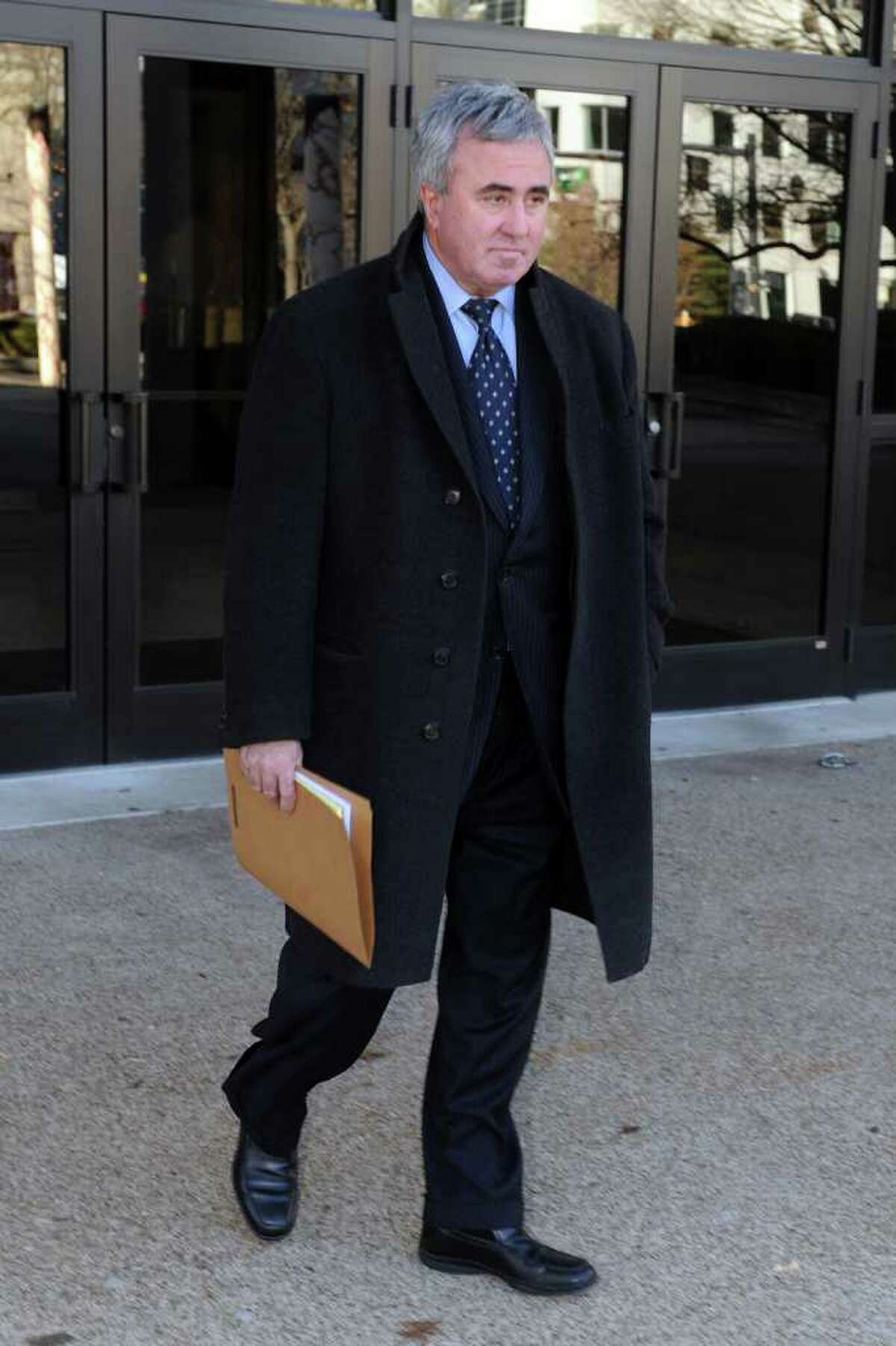 Attorney Michael "Mickey" Sherman leaves U.S. District Court in Bridgeport, Conn. Dec. 22nd, 2010. Sherman was sentenced to a year and a day in prison for failing to pay income tax. He is scheduled to report to prison in March.