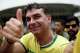 Opposition presidential candidate Flavio Bolsonaro gives a thumbs-up to supporters as he arrives at a hotel before attending a campaign rally in Rio de Janeiro, Brazil, Sunday, Aug. 16, 2026.