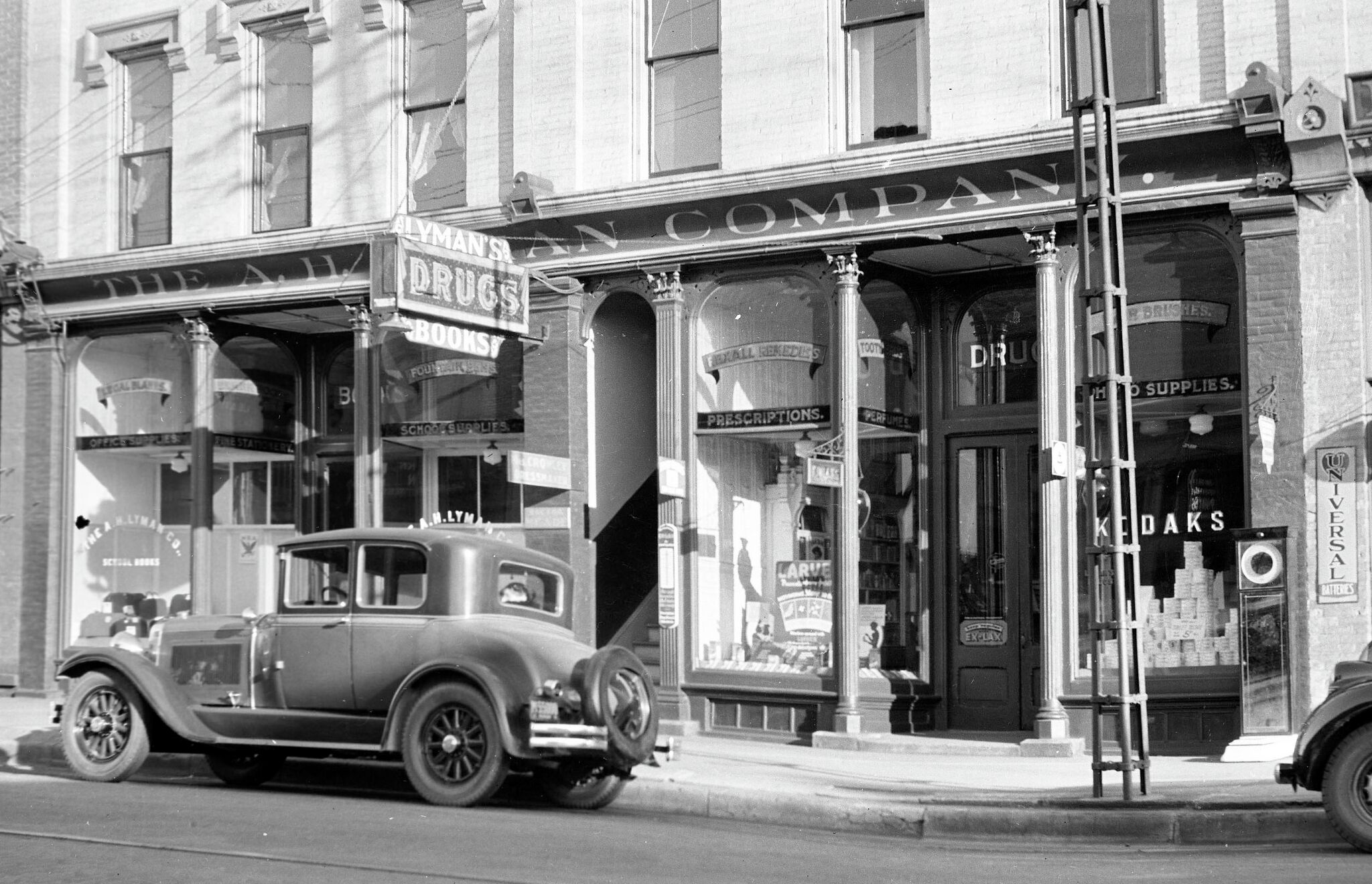 A photo from the mid-1920s shows a view of the outside of the A.H. Lyman Drug Company at 425 River St. in Manistee.