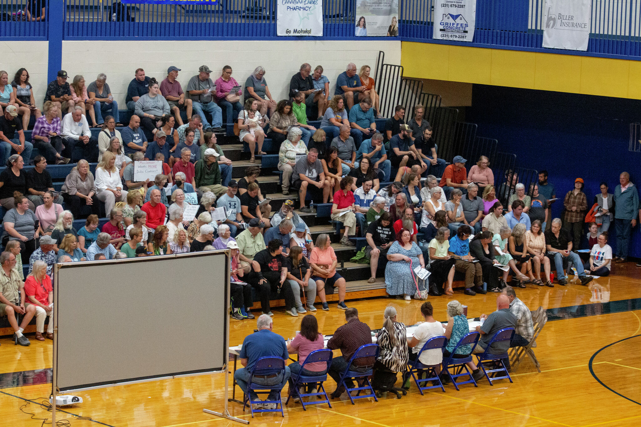 About 300 people packed Morley Stanwood High School as residents questioned a company's interest in using Frank Deyo Dam to power a small computing facility.