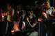 People gather at a vigil for earthquake victims in Cali, Colombia, Saturday, Aug. 15, 2026.