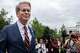 Treasury Secretary Scott Bessent walks past reporters following an interview with Fox News outside the White House, Thursday, July 30, 2026, in Washington.