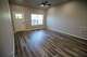 The living room and front door of Delores and Jerry Green’s new home pictured, Monday, Aug. 17, 2026, in Farmers Branch.