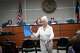 Country singer and landowner Tanya Tucker waves to the crowd after testifying against a proposed 765kv transmission line route at a House of Representative State Affairs committee meeting at the State Capitol in Austin, Wednesday, Aug. 19, 2026.