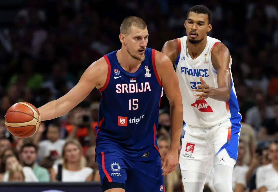 Nikola Jokic (L) of Serbia in action against Victor Wembanyama of France dunks the ball during the friendly match between Serbia and France at Belgrade Arena on August 20, 2026 in Belgrade, Serbia.