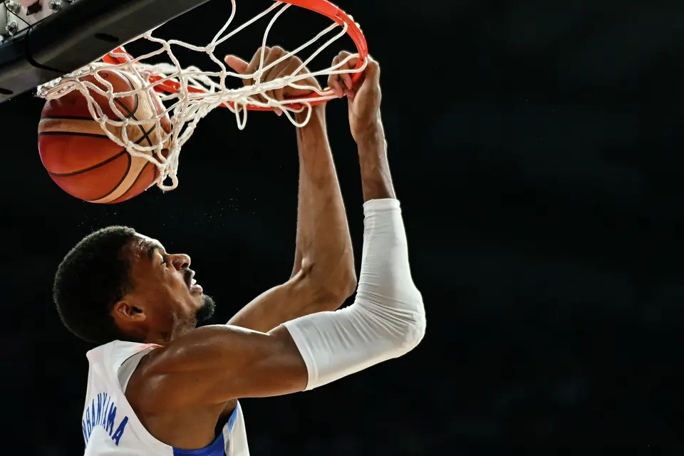 France's #32 Victor Wembanyama scores a basket during the friendly basketball match between Serbia and France, at the Belgrade Arena, in Belgrade, on August 20, 2026.