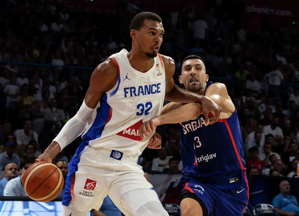 Victor Wembanyama (L) of France in action against Ognjen Dobric of Serbia during the friendly match between Serbia and France at Belgrade Arena on August 20, 2026 in Belgrade, Serbia.
