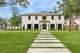 A slurried brick exterior with custom gas lanterns adds a stately, yet still modern, look to this residence in Hunters Creek. Casey Charles of Del Monte Realty marketed the home for sale with co-lilsting agent Katie Wells.