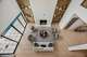 A view of the double-height living room from above.