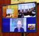 Defense attorney Kevin Reddington, on screen at the upper left, interview defense witness Dr. Phillip Resnick, lower on screen, on a remote feed from Cleveland, Ohio, during Lindsay Clancy's murder trial in Plymouth Superior Court Aug, 21, 2026.