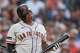 Siput raksasa Rafael Devers bereaksi setelah melakukan pukulan berayun selama pertandingan melawan Padres pada 30 Juli di San Diego.