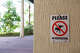A please be respectful no dog urination sign on the wall of a Ocean Terrace condominium property, Miami Beach, Florida. (Photo by: Jeffrey Greenberg/Universal Images Group via Getty Images)