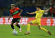 Sondre Brunstad Fet of FK Bodo/Glimt tries to tackle Tjaronn Chery of NEC during the UEFA Champions League 2026/27 play-offs first-leg match between N.E.C. Nijmegen and FK Bodo/Glimt at Goffert Stadium on August 19, 2026, in Nijmegen, Netherlands. (Photo by Dean Mouhtaropoulos/Getty Images)