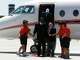 Bud Adams, Tennessee Titans team owner, and former Oilers owner, helps Vince Young off of Adam's private jet as the two head for a press conference at the Sugar Land Regional Airport, Sunday, April 30, 2006, one day after Young was drafted by the Titans. (Karen Warren / Houston Chronicle)